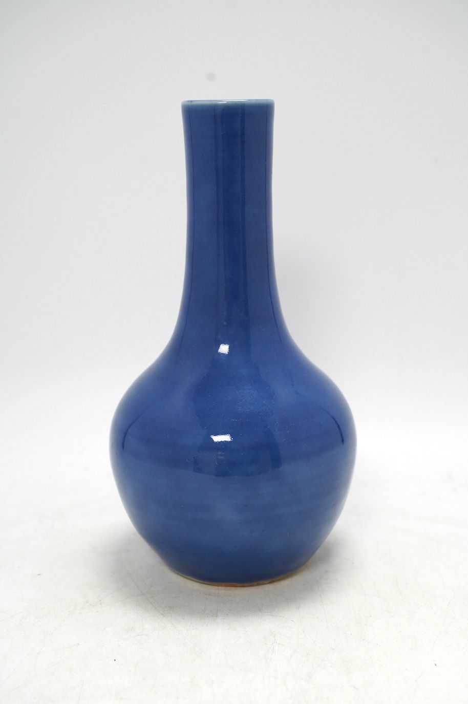 A Chinese blue glazed bottle, Qianlong mark but later, 23cm high. Condition - good